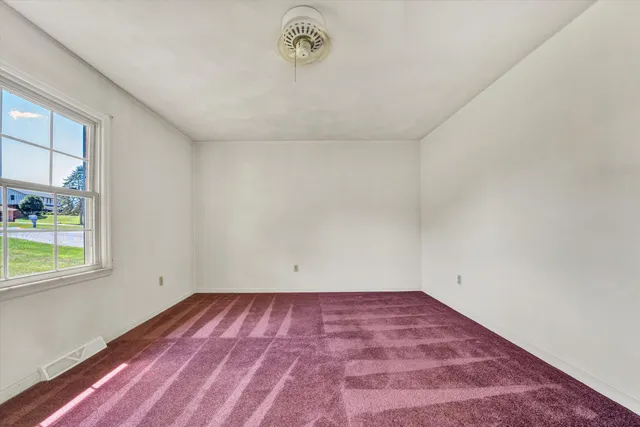 a large kitchen with stainless steel appliances granite countertop a granite counter tops and a window