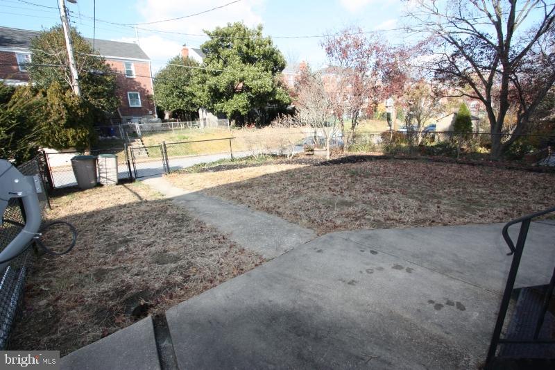 8110 Glen Gary Road Towson, MD 21286 - Photo 4 of 31 Concrete patio area out back / fenced in yard