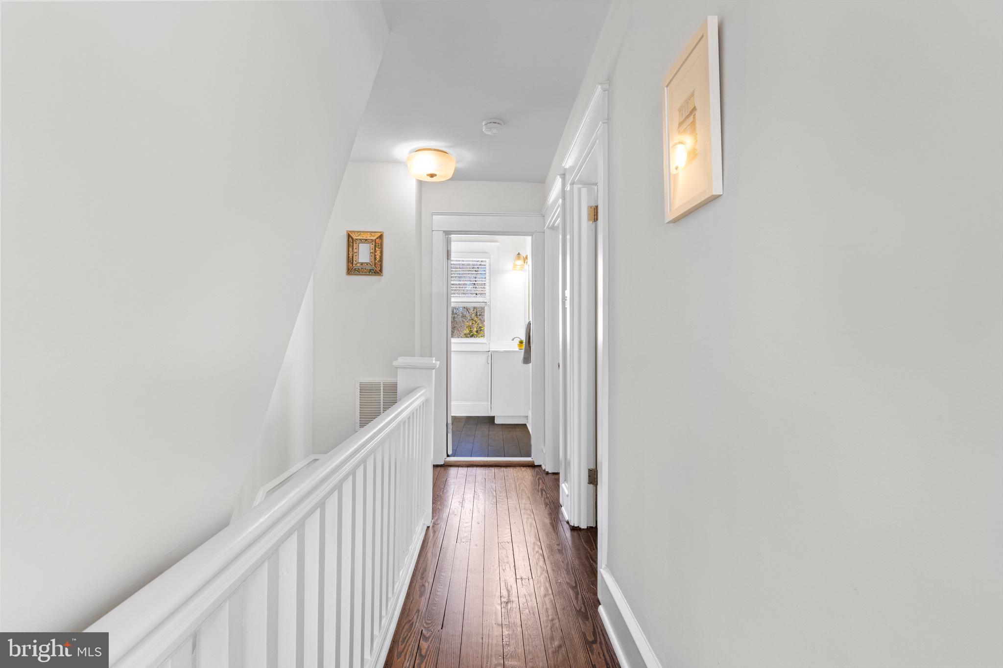 657 West End Walk Media, PA 19063 - Photo 14 of 26 a view of a hallway with wooden floor