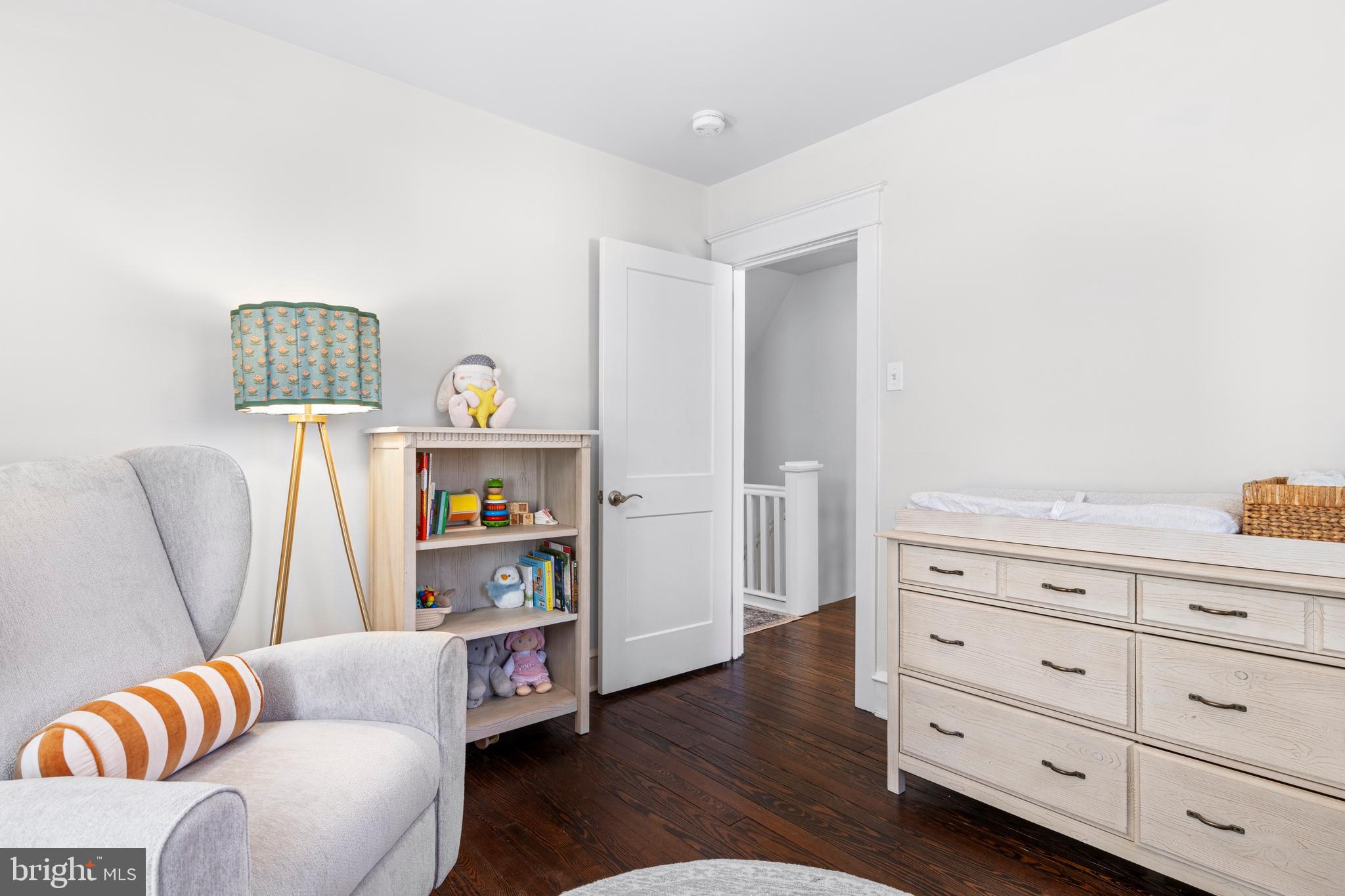657 West End Walk Media, PA 19063 - Photo 20 of 26 a living room with furniture and a wooden floor
