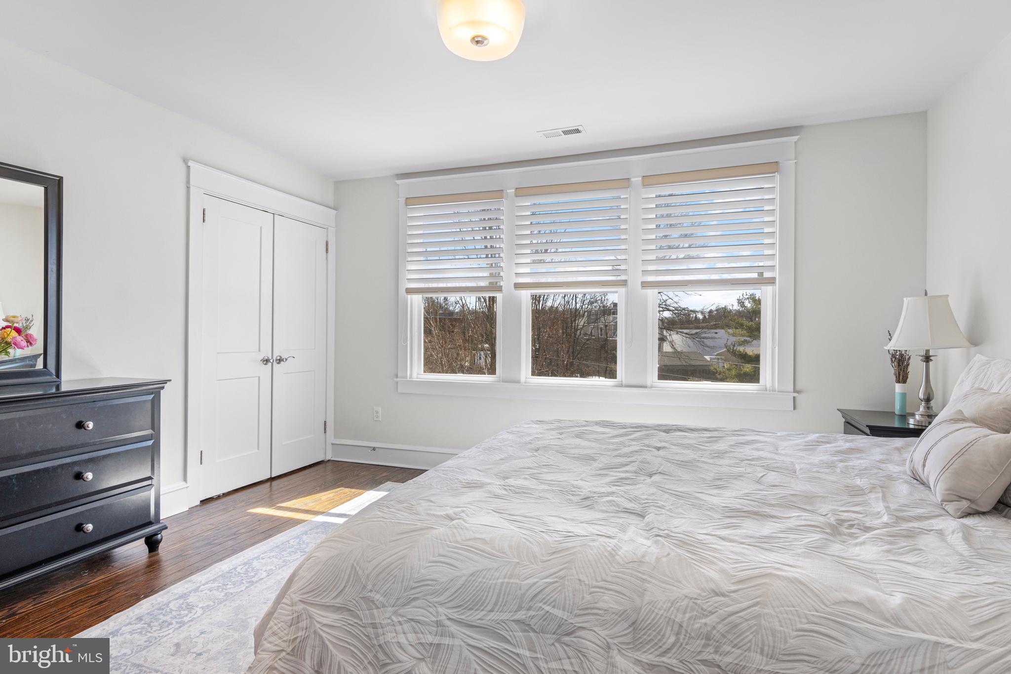 657 West End Walk Media, PA 19063 - Photo 23 of 26 a view of a bedroom with a bed and wooden floor