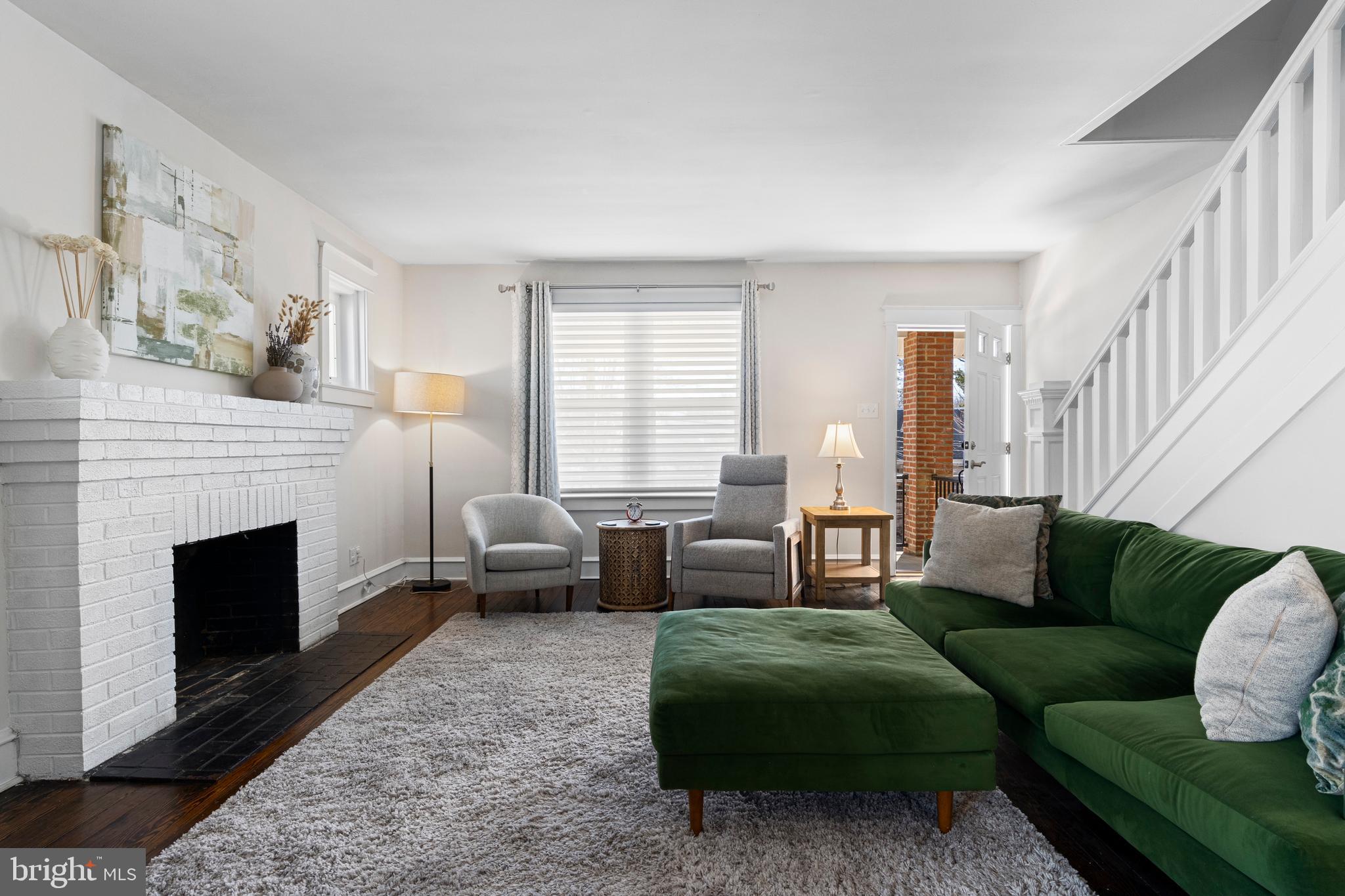 657 West End Walk Media, PA 19063 - Photo 4 of 26 a living room with furniture and a fireplace