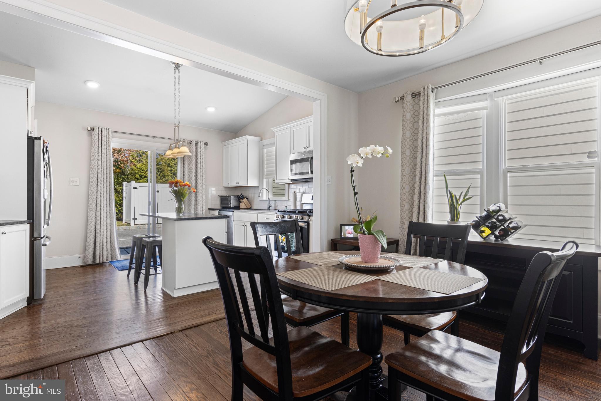657 West End Walk Media, PA 19063 - Photo 8 of 26 a view of a dining room with furniture window and wooden floor