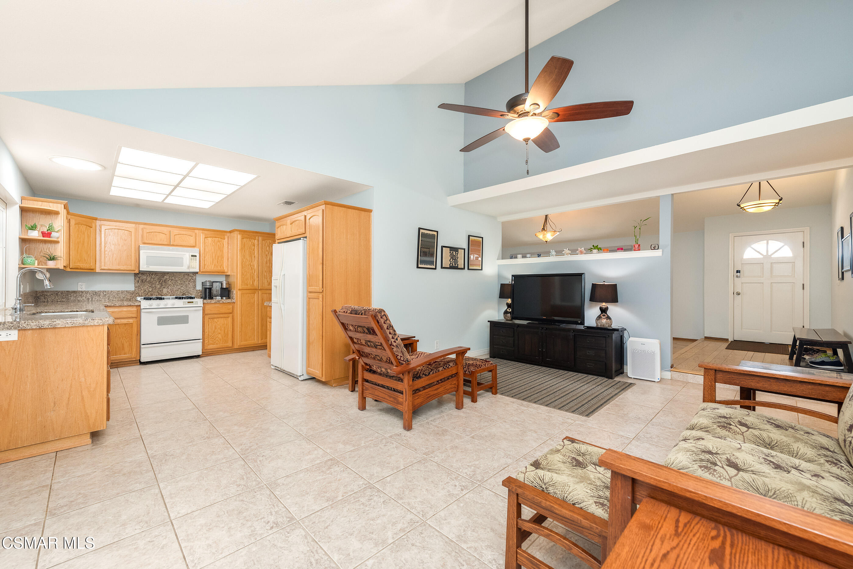 2226 Ecroyd Avenue Simi Valley, CA 93063 - Photo 16 of 52 a living room with furniture and kitchen view