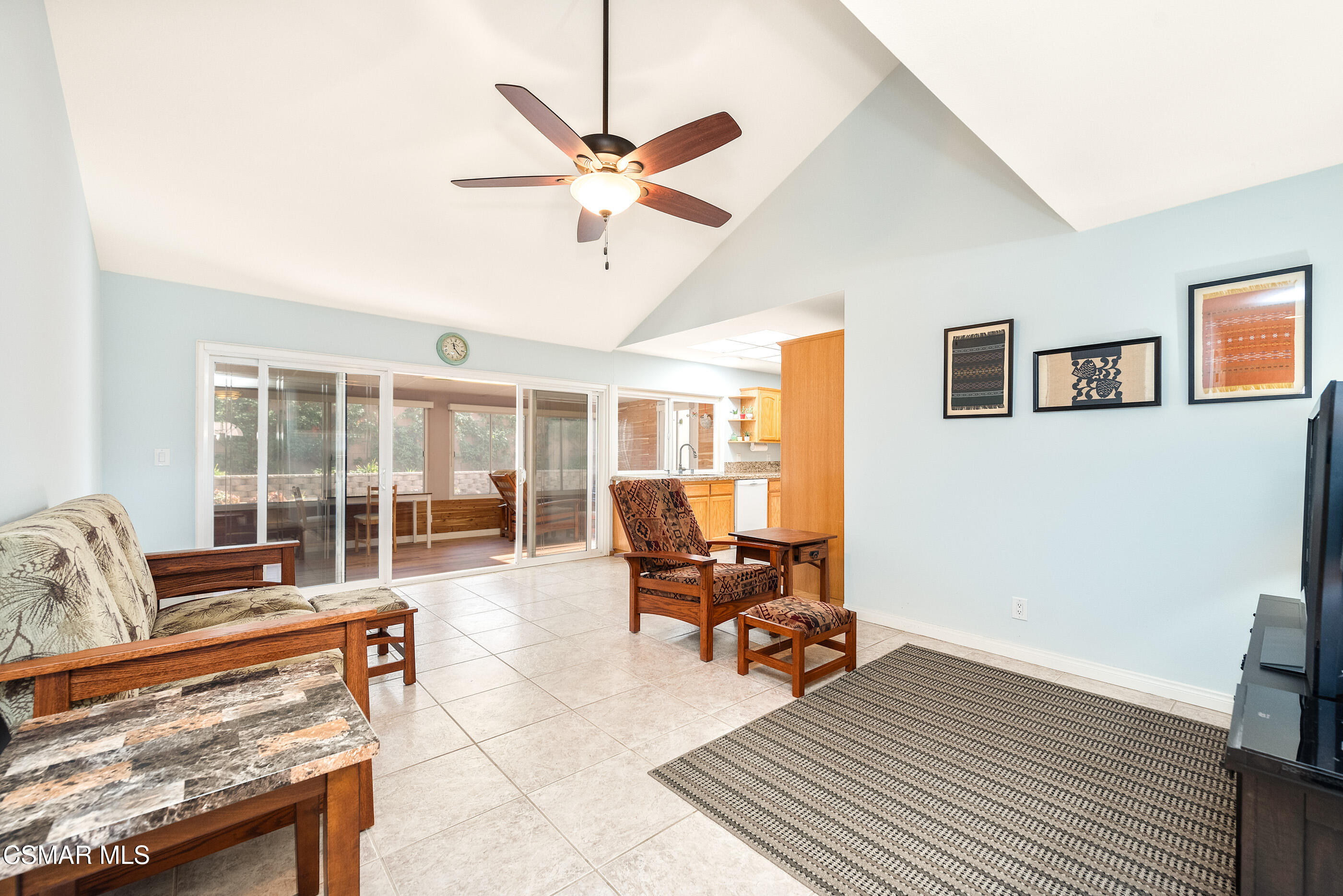 2226 Ecroyd Avenue Simi Valley, CA 93063 - Photo 21 of 52 a living room with furniture and a floor to ceiling window