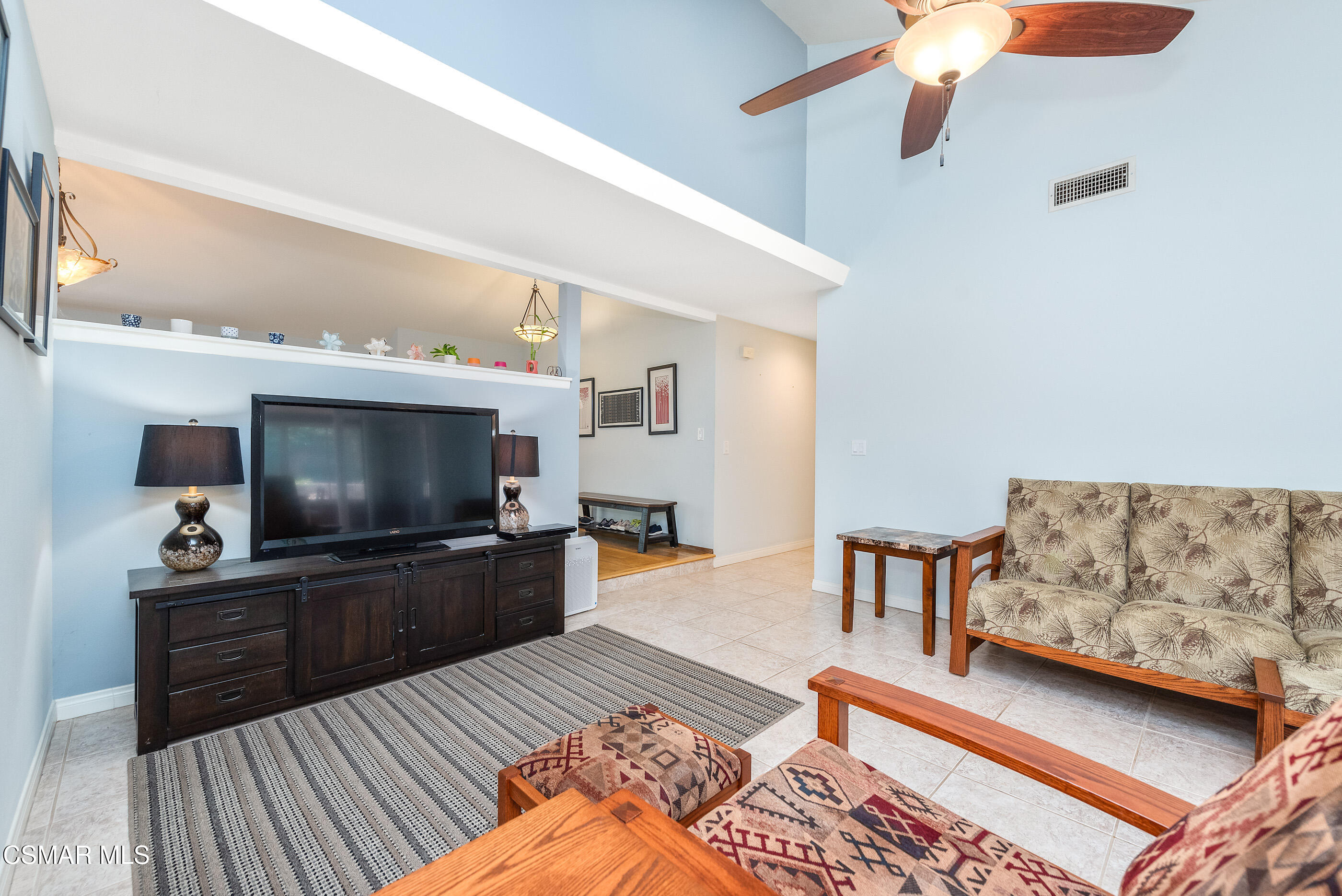 2226 Ecroyd Avenue Simi Valley, CA 93063 - Photo 23 of 52 a living room with furniture and a flat screen tv