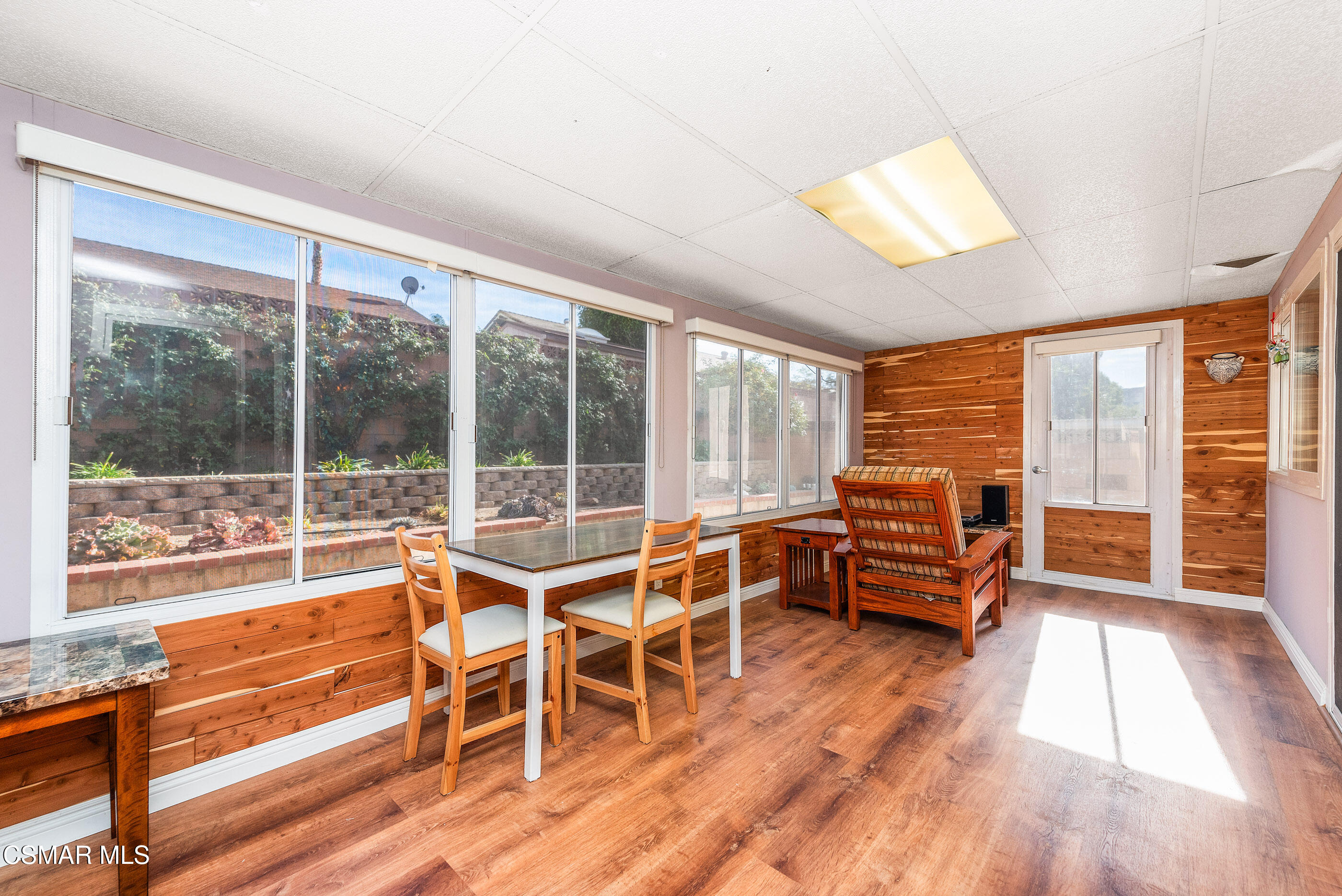 2226 Ecroyd Avenue Simi Valley, CA 93063 - Photo 27 of 52 a view of a room with furniture wooden floor and windows