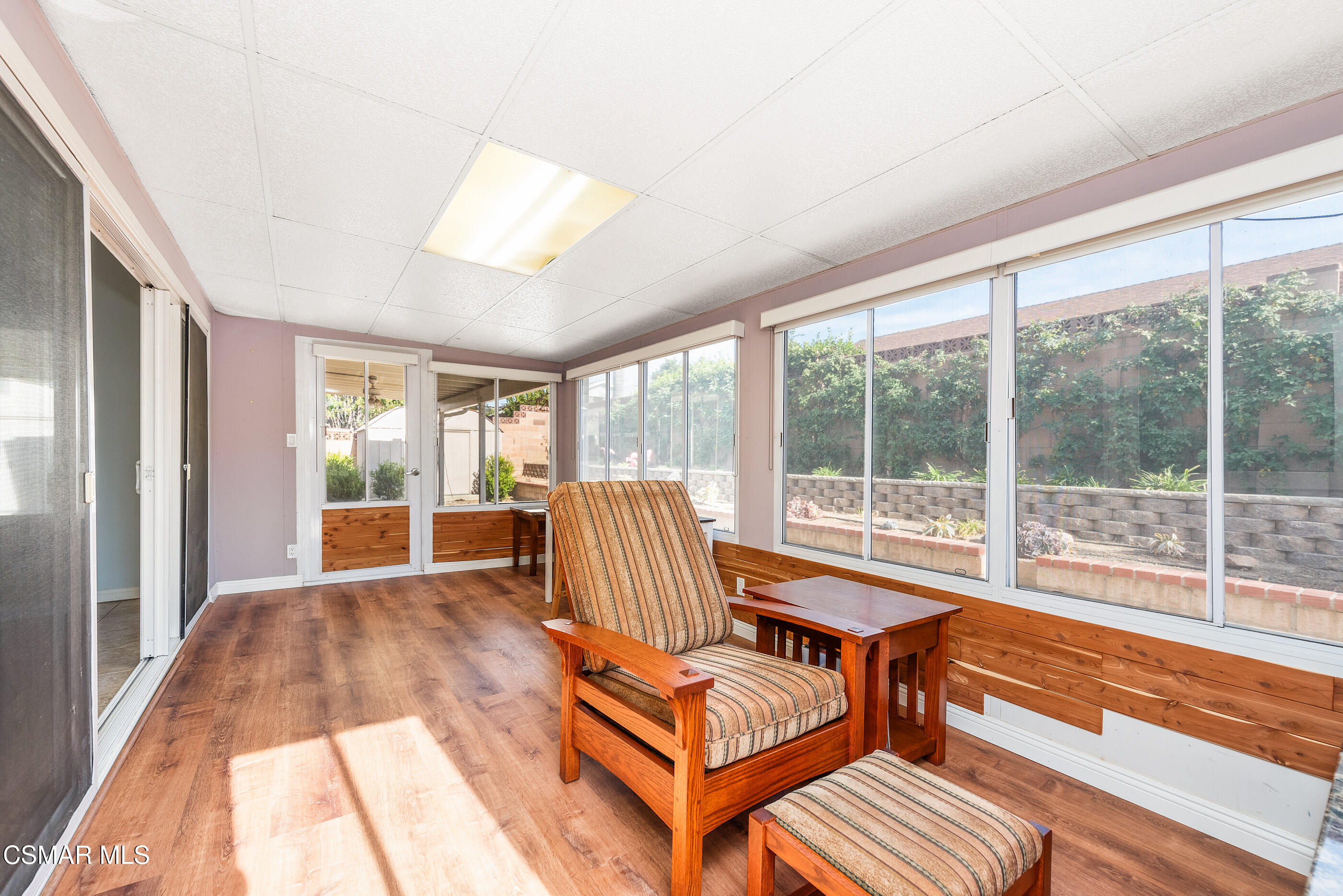 2226 Ecroyd Avenue Simi Valley, CA 93063 - Photo 28 of 52 a living room with furniture and a large window