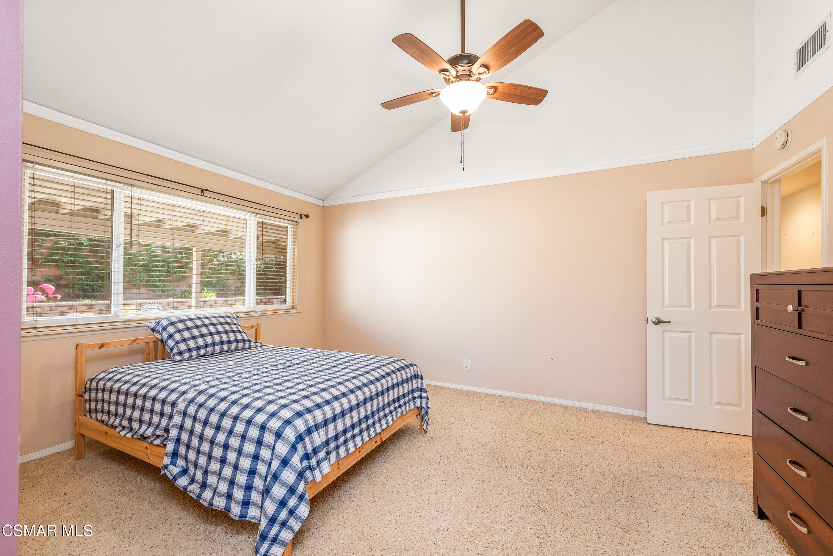 2226 Ecroyd Avenue Simi Valley, CA 93063 - Photo 31 of 52 a bedroom with a large bed and a window