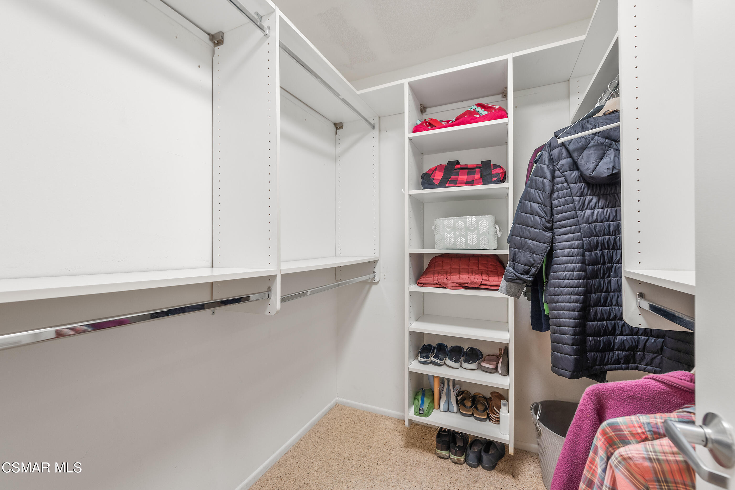 2226 Ecroyd Avenue Simi Valley, CA 93063 - Photo 32 of 52 a view of walk in closet with clothes and shoes