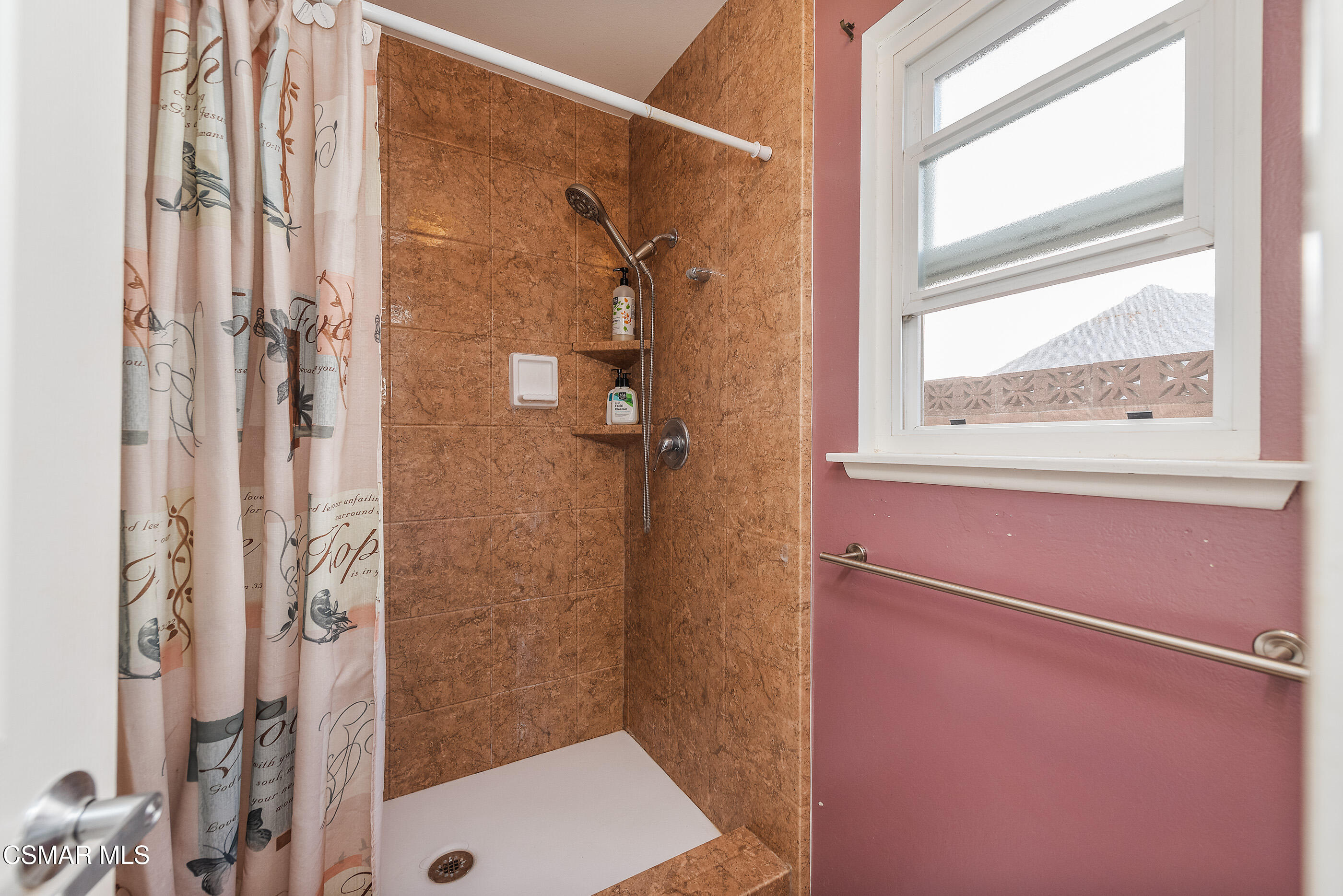 2226 Ecroyd Avenue Simi Valley, CA 93063 - Photo 34 of 52 a bathroom with a shower and a sink