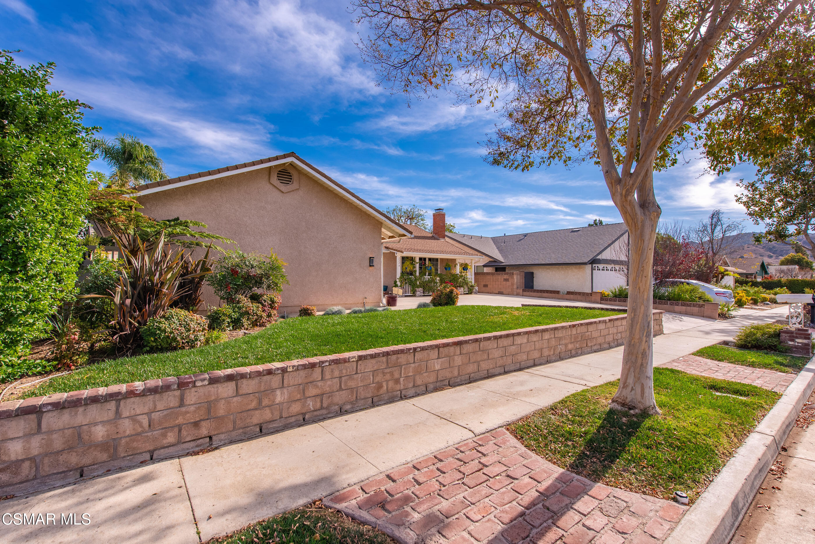 2226 Ecroyd Avenue Simi Valley, CA 93063 - Photo 5 of 52 a front view of a house with a yard