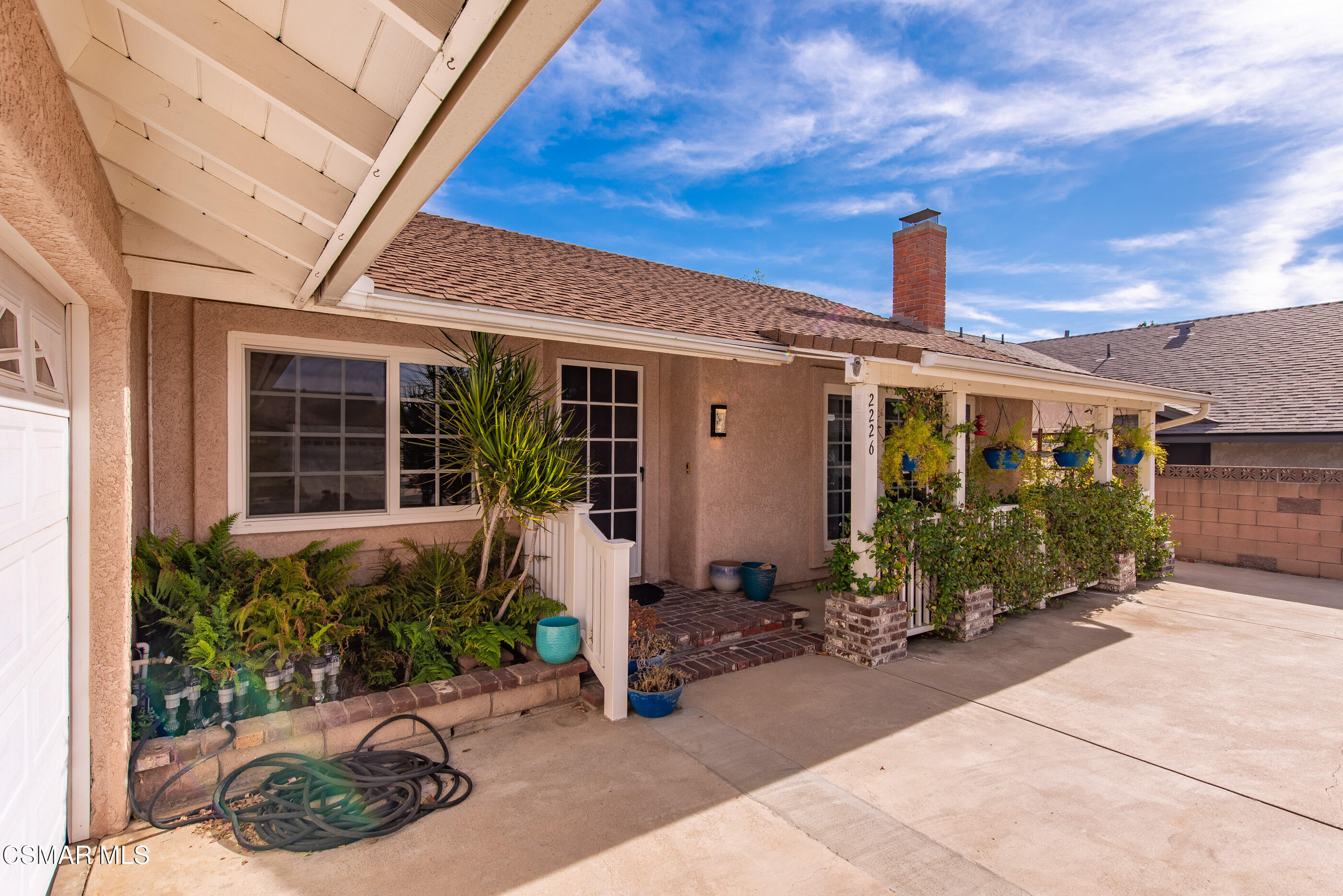 2226 Ecroyd Avenue Simi Valley, CA 93063 - Photo 6 of 52 a front view of a house with garden