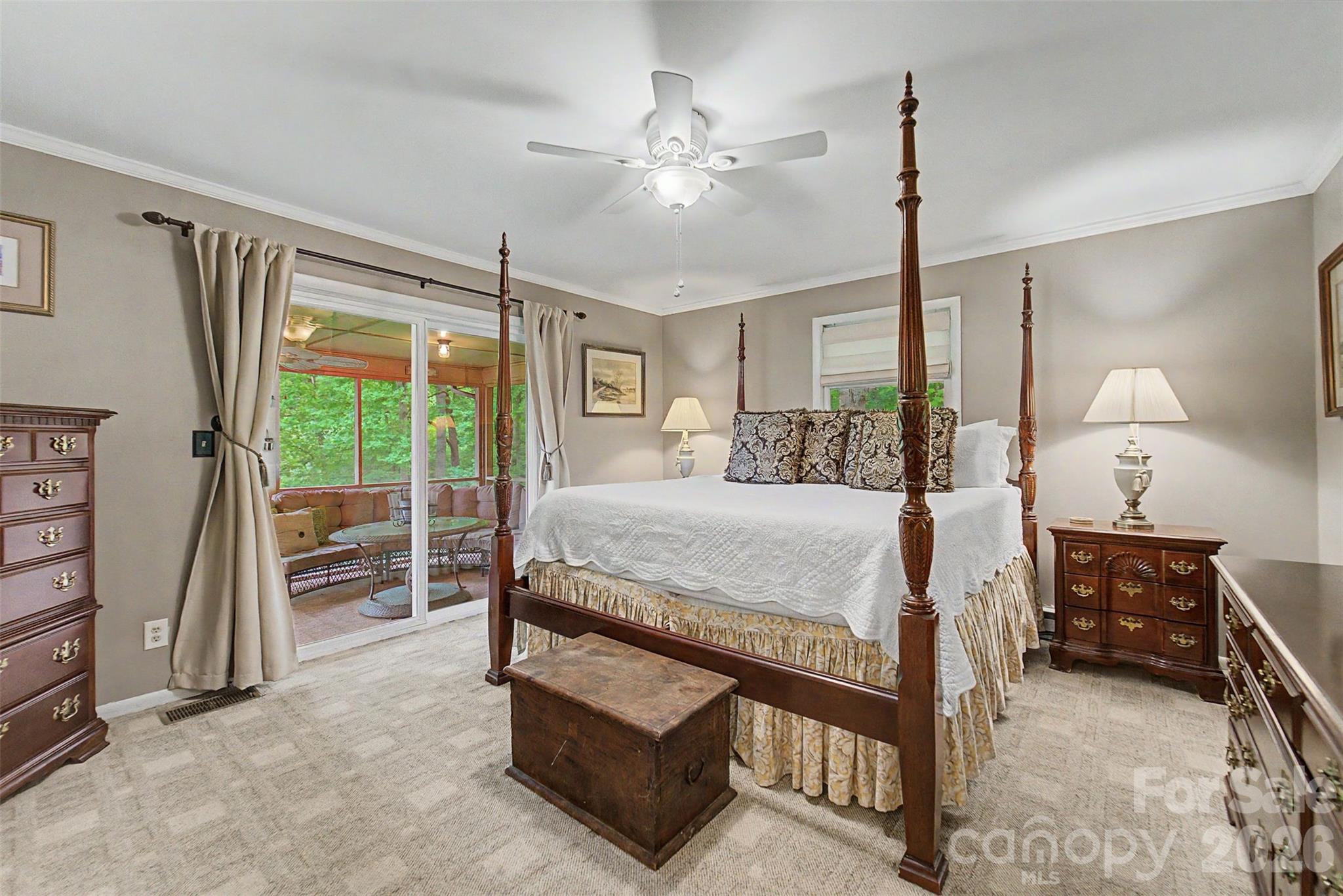 1413 Kitchens Branch Road Sylva, NC 28779 - Photo 16 of 46 a bed room with a bed and a window