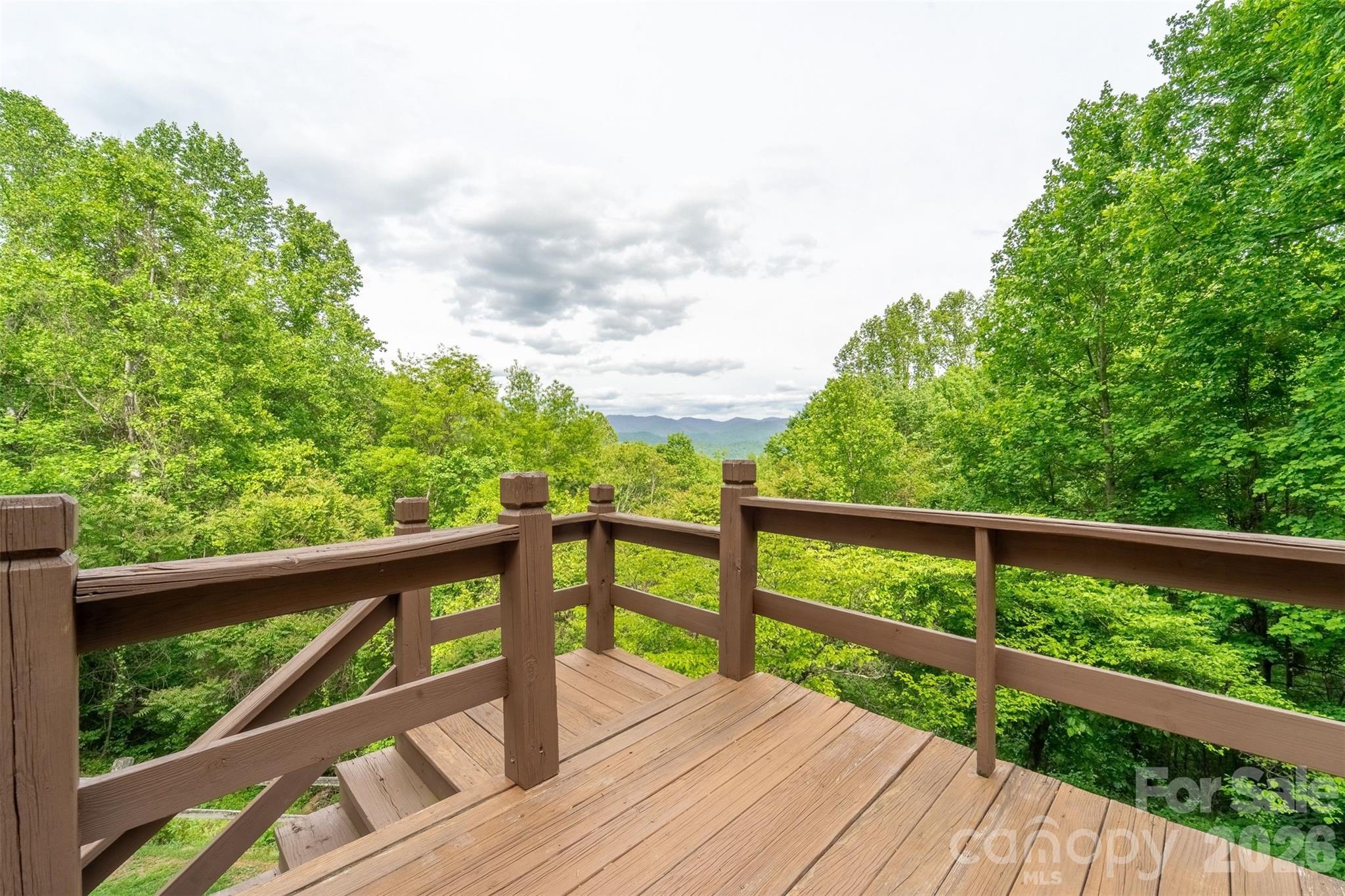 1413 Kitchens Branch Road Sylva, NC 28779 - Photo 33 of 46 a view of balcony with wooden floor and fence
