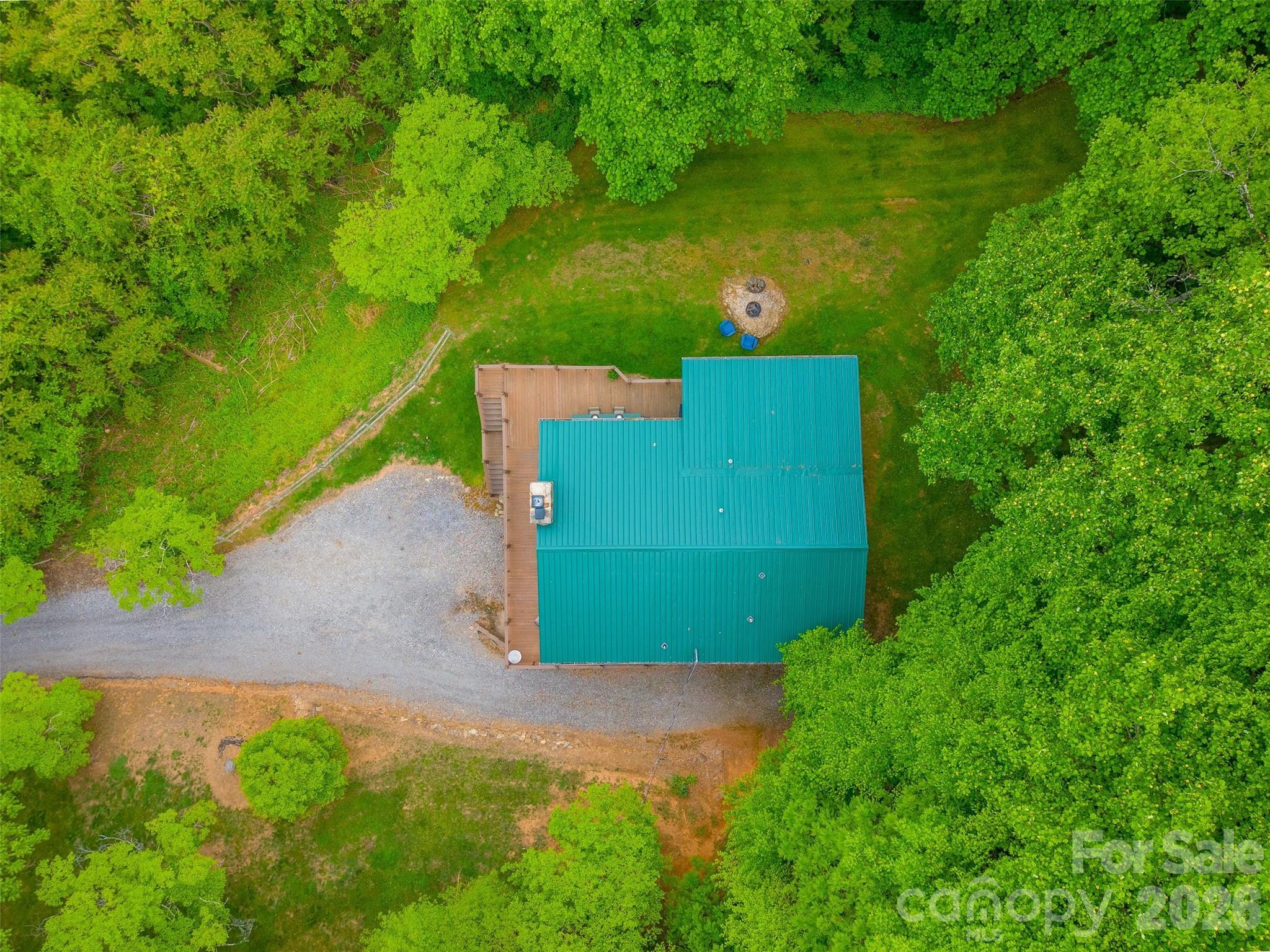 1413 Kitchens Branch Road Sylva, NC 28779 - Photo 45 of 46 an aerial view of a house
