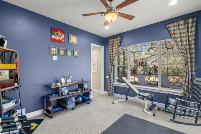 a view of a patio with swimming pool table and chairs