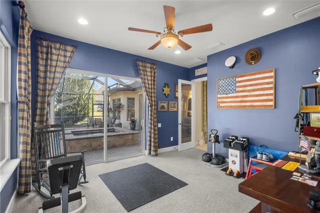 a view of a swimming pool and lounge chair