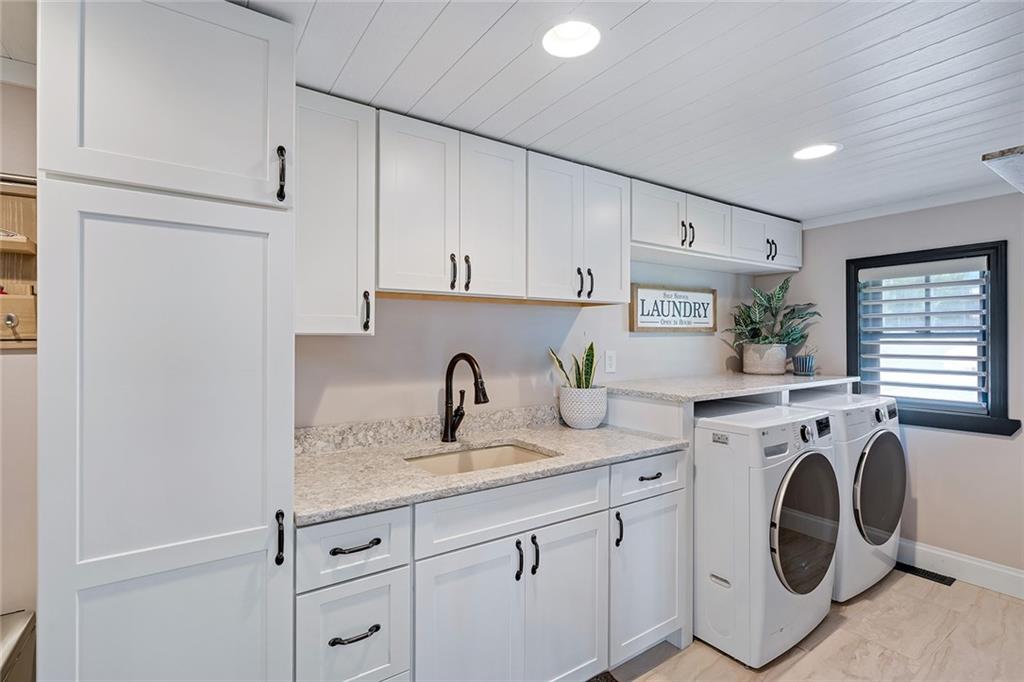 13399 Treasure Lake Road Du Bois, PA 15801 - Photo 24 of 49 a view of cabinets a washer and dryer
