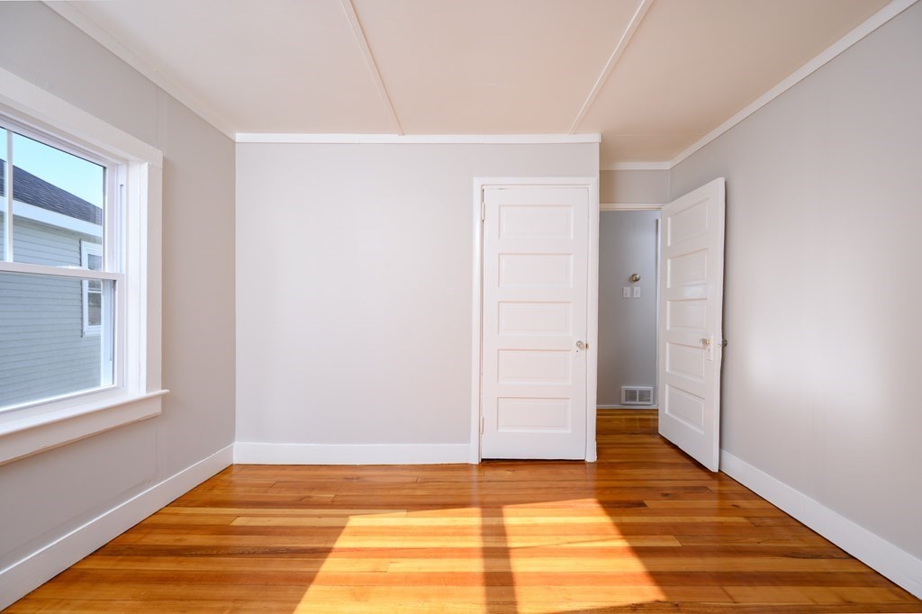 6 Atherton Road, Unit 2 Hull, MA 02045 - Photo 16 of 24 a view of room with window and hardwood floor