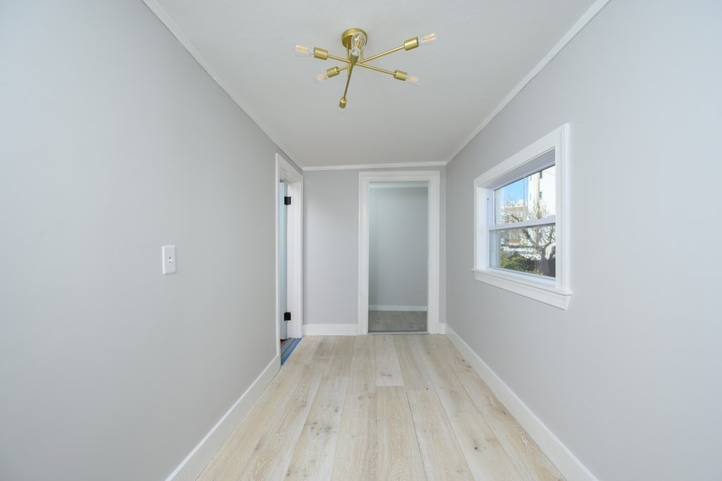 6 Atherton Road, Unit 2 Hull, MA 02045 - Photo 18 of 24 a view of room with window and ceiling fan