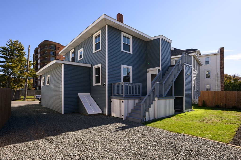 6 Atherton Road, Unit 2 Hull, MA 02045 - Photo 19 of 24 a front view of a house with a yard