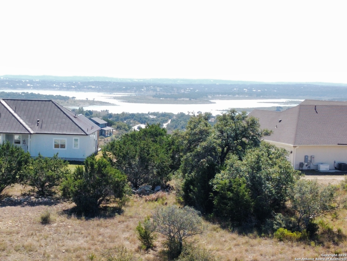 23403 North Cranes Mill Road Spring Branch, TX 78070 - Photo 8 of 13 an aerial view of multiple house