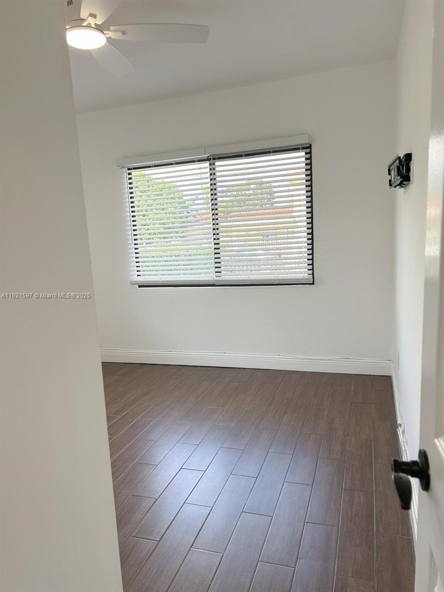 5790 Southwest 5th Street Miami, FL 33144 - Photo 11 of 31 an empty room with a window