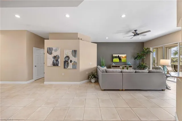 a living room with furniture and window
