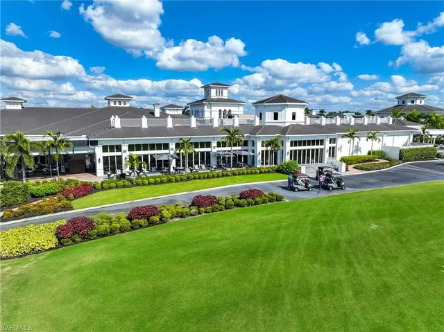 a view of a golf course with a lake