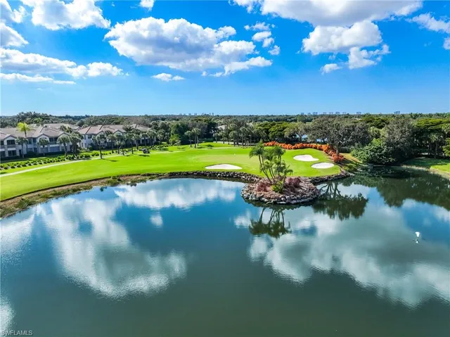 a view of an house with a big yard