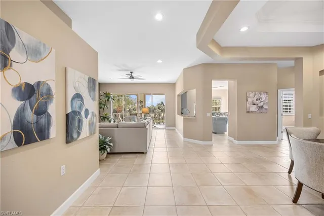 a view of a kitchen with furniture and staircase