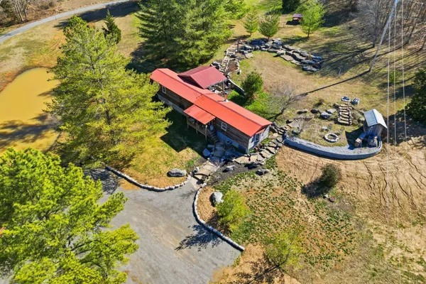 a aerial view of a yard with swimming pool