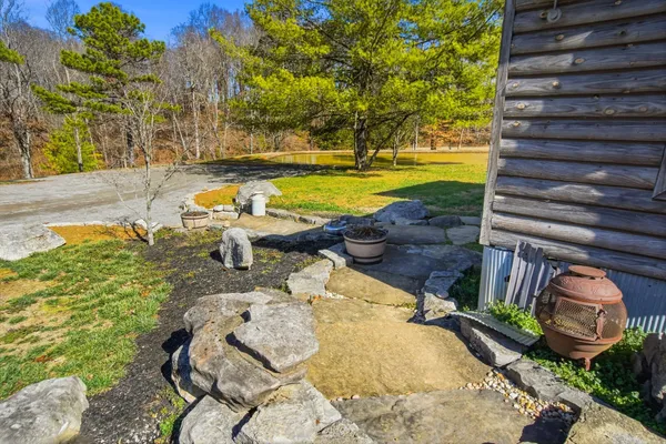 a view of an outdoor space with furniture