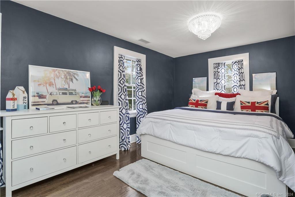 61 Hillandale Road Westport, CT 06880 - Photo 17 of 40 a bedroom with a bed and a dresser in it