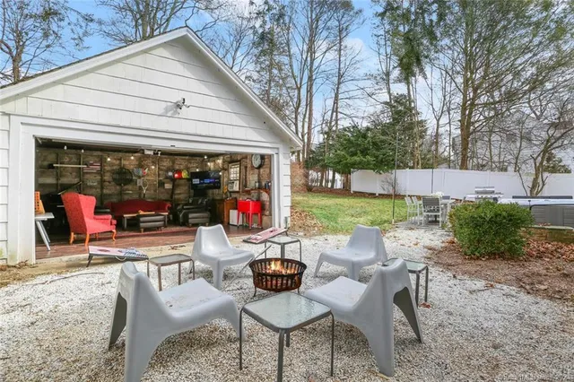 a outdoor living space with patio furniture and a potted plant