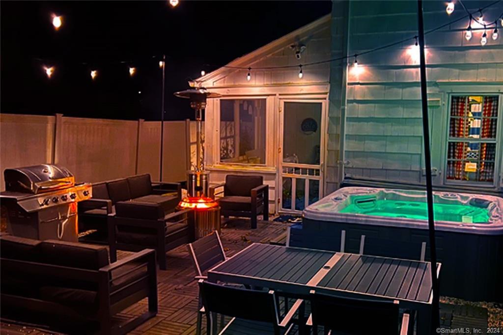 61 Hillandale Road Westport, CT 06880 - Photo 31 of 40 a roof deck with table and chairs