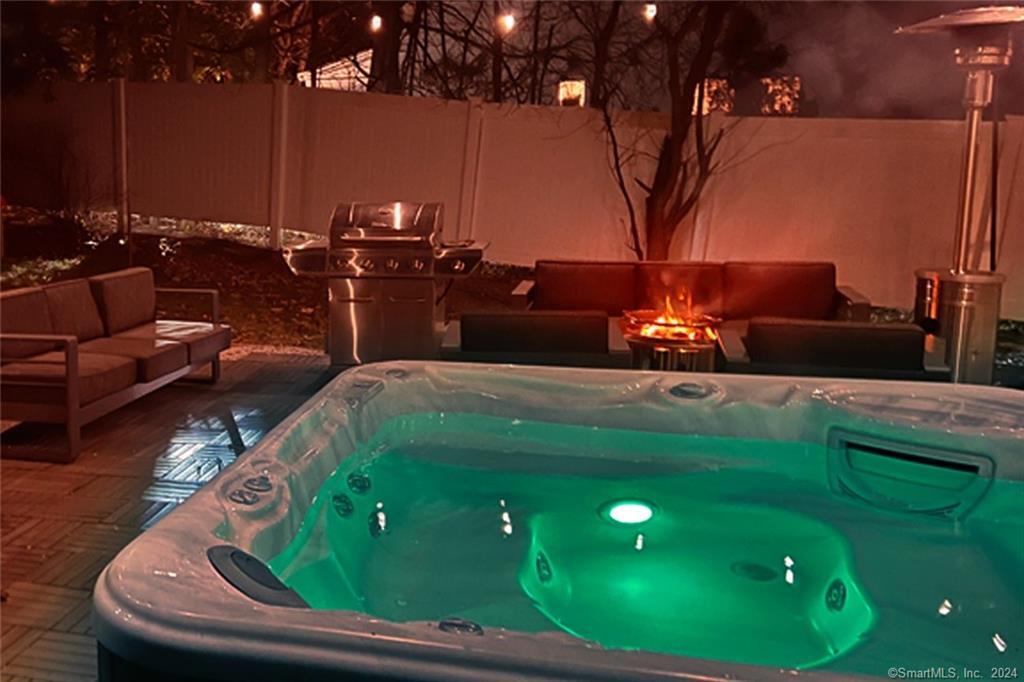 61 Hillandale Road Westport, CT 06880 - Photo 32 of 40 a roof deck with table and chairs with plants