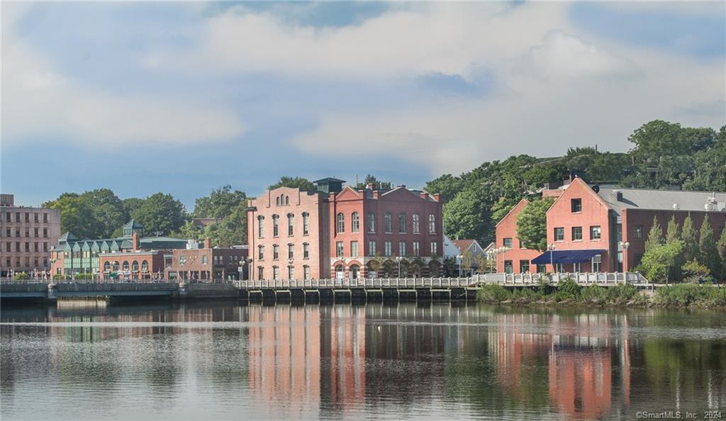 61 Hillandale Road Westport, CT 06880 - Photo 35 of 40 a view of houses with swimming pool and lake view