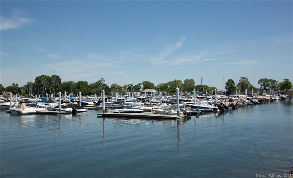 61 Hillandale Road Westport, CT 06880 - Photo 38 of 40 a view of a lake with outdoor seating space