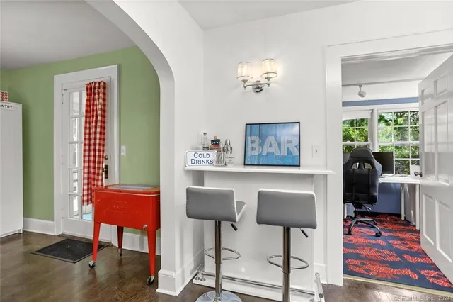 a workspace with furniture and a window