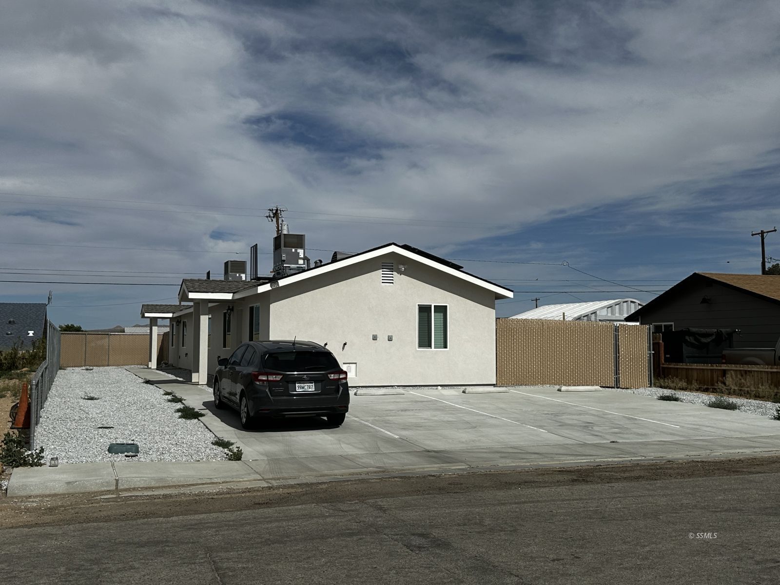 1424 South Farragut Street Ridgecrest, CA 93555 - Photo 1 of 13 a car parked on the side of the road