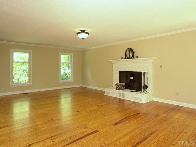 601 Ted Avenue Raleigh, NC 27614 - Photo 6 of 24 Enjoy the wood burning fireplace on cold wintry nights. Den/Family/Great Room