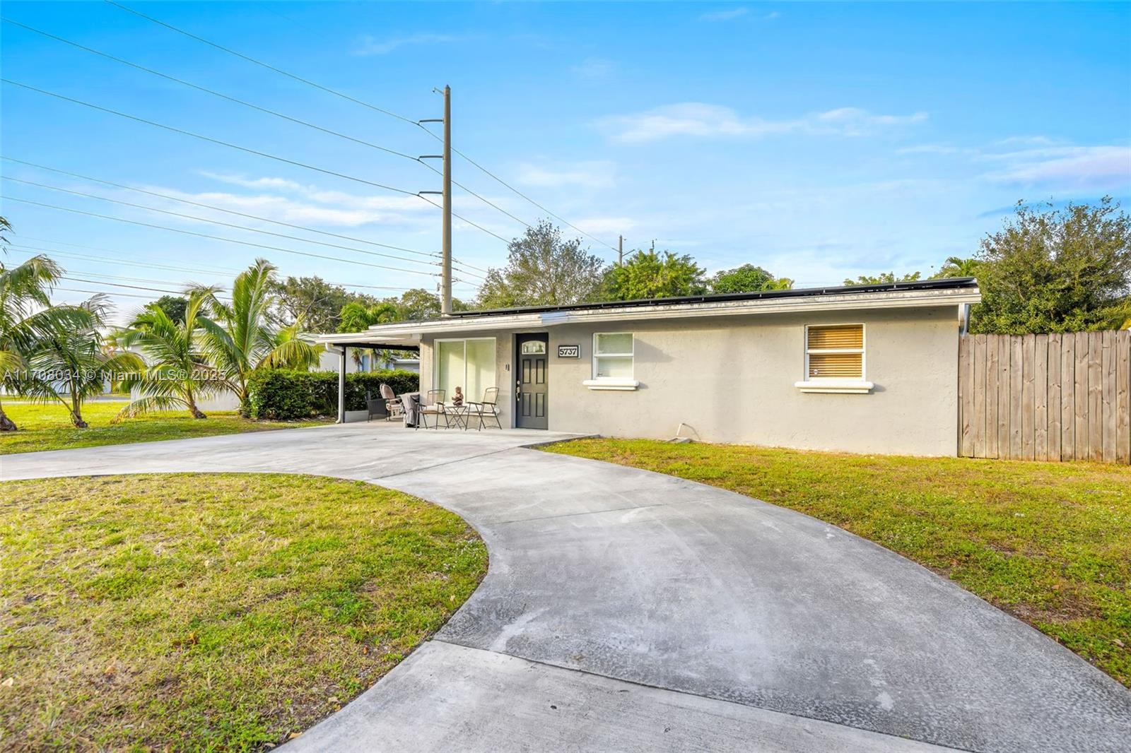 5737 Greene Street Hollywood, FL 33021 - Photo 2 of 19 a view of a house with pool