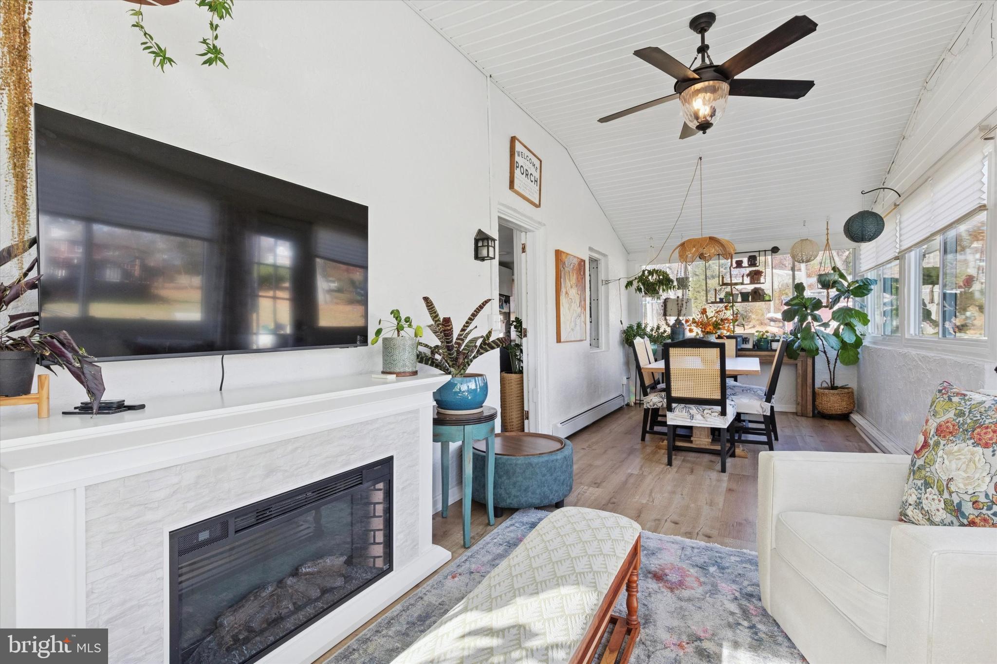 5 Mary Jane Street Spring Mount, PA 19473 - Photo 15 of 25 a living room with furniture a flat screen tv and a fireplace