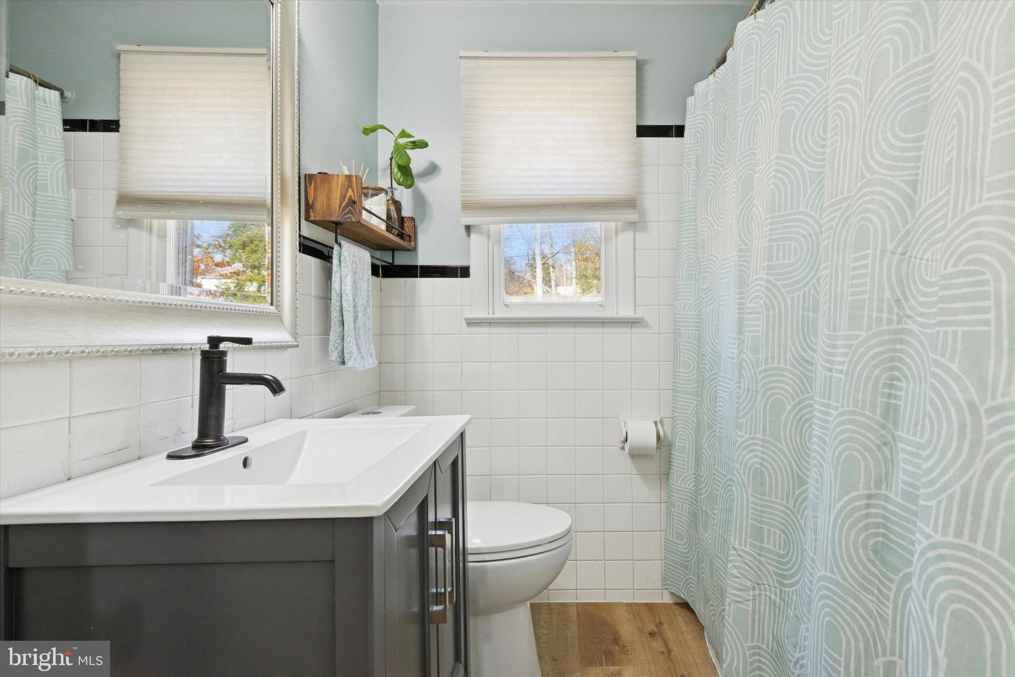 5 Mary Jane Street Spring Mount, PA 19473 - Photo 23 of 25 a bathroom with a toilet sink and mirror