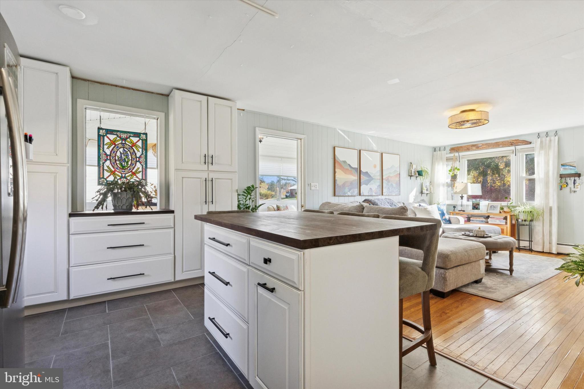5 Mary Jane Street Spring Mount, PA 19473 - Photo 7 of 25 a kitchen with granite countertop a sink cabinets and wooden floor