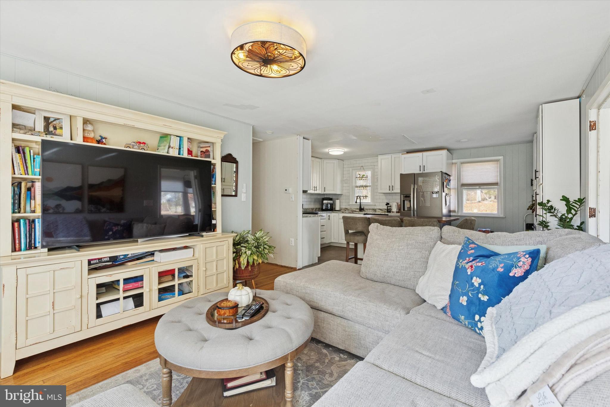 5 Mary Jane Street Spring Mount, PA 19473 - Photo 10 of 25 a living room with furniture and a flat screen tv