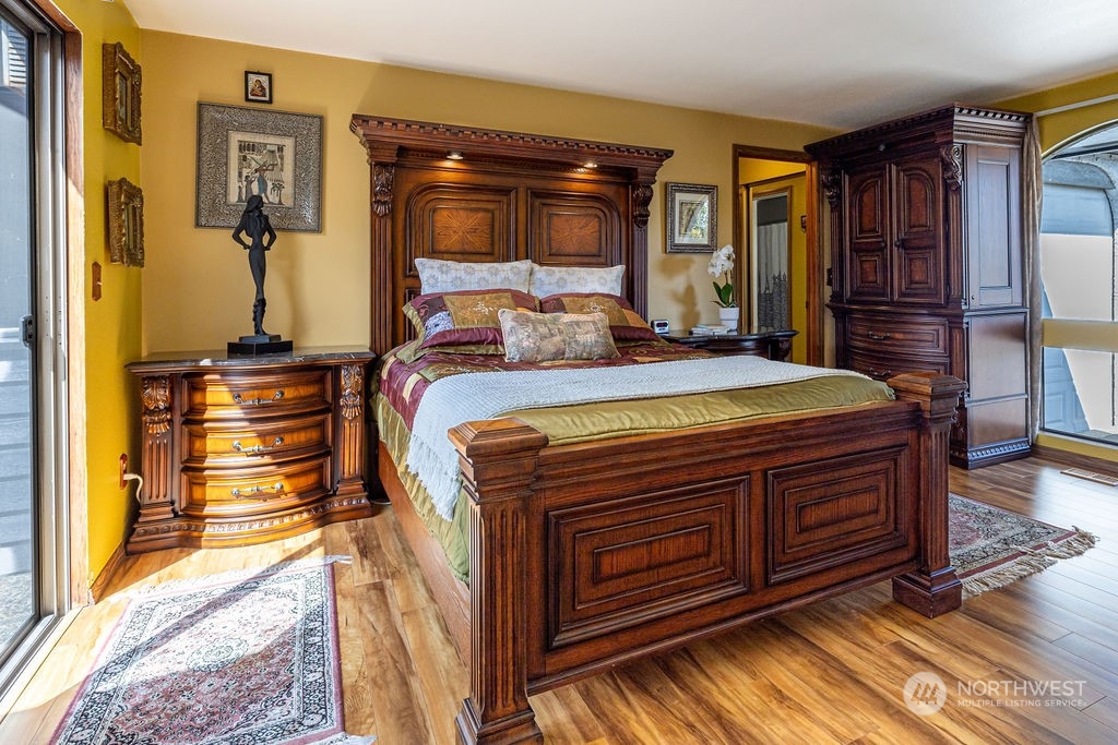 22422 4th Avenue Southeast Bothell, WA 98021 - Photo 14 of 39 a bed sitting in a bedroom next to a window