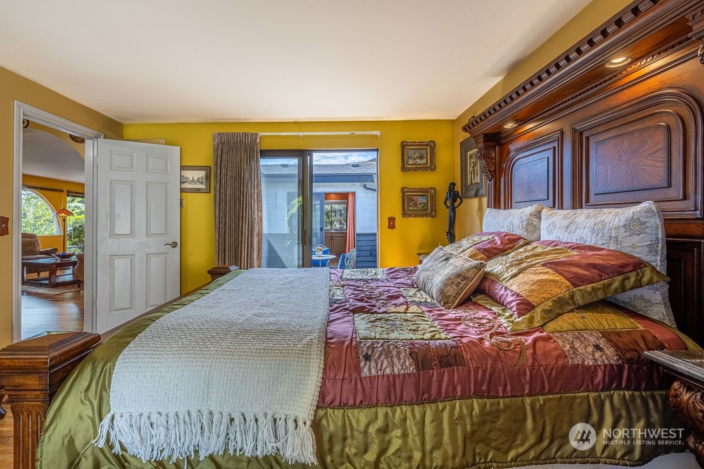 22422 4th Avenue Southeast Bothell, WA 98021 - Photo 15 of 39 a bedroom with a bed and dresser with mirror
